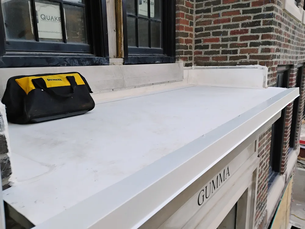 Completed residential balcony waterproofing project on a two-story home in Metro Detroit