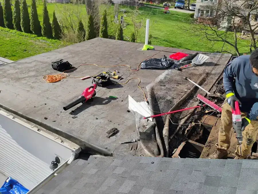Failing flat roof membrane before replacement